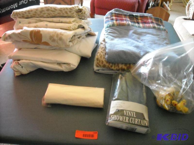 lot 184 image: misc bathroom items and bed sheets