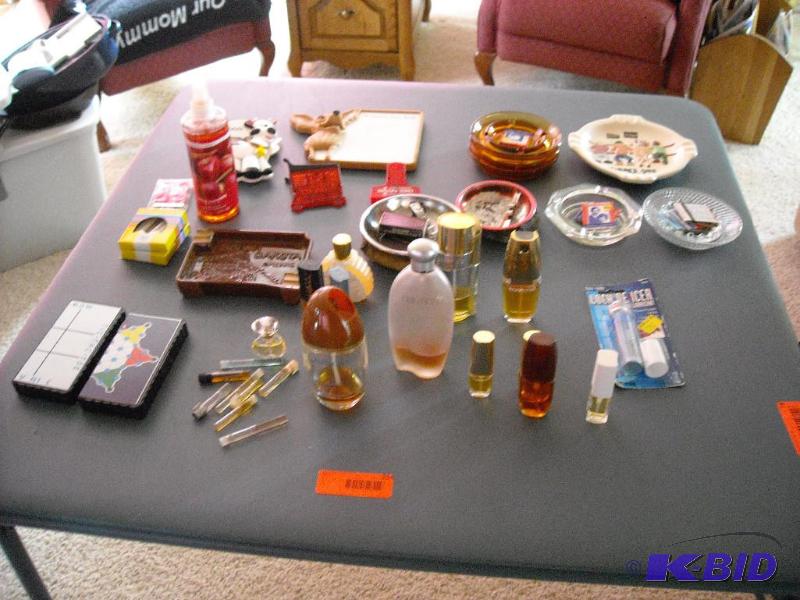 lot 214 image: ash trays, perfume and other misc