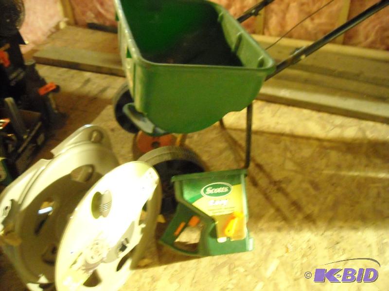 lot 275 image: hose side winder, Scotts handheld speakers, Scotts speedy green 3000 lawn mower