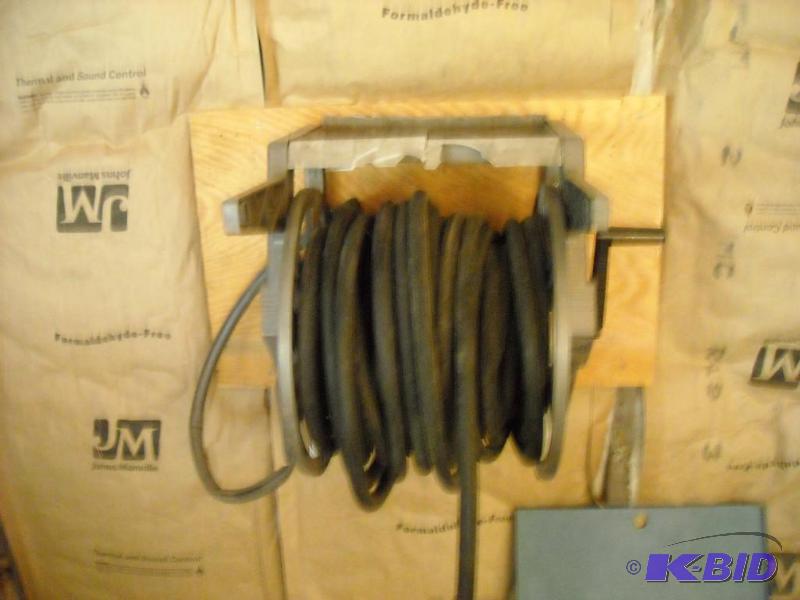 lot 352 image: black rubber hose and hose reel