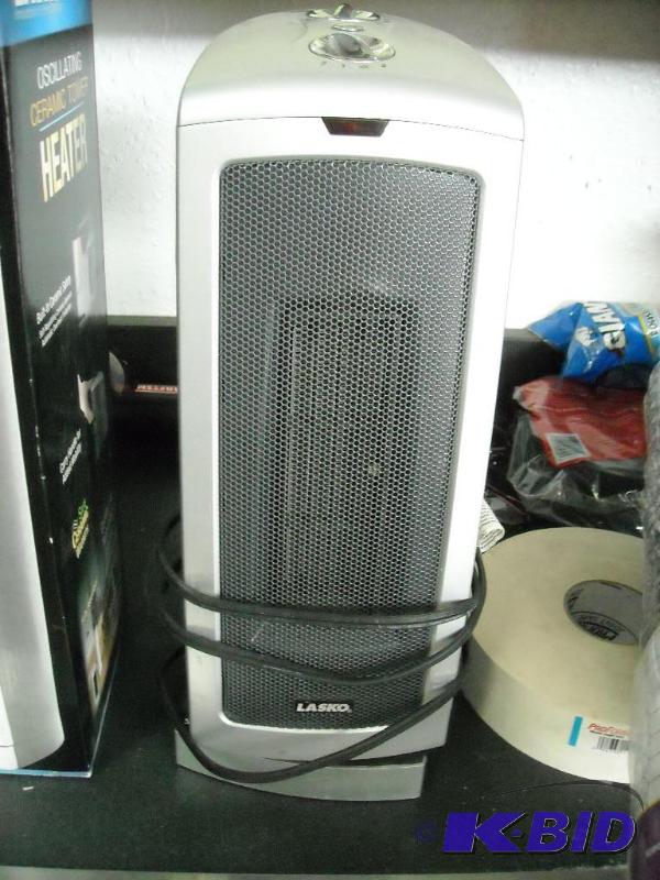 lot 353 image: Lasko osilating ceramic tower heater