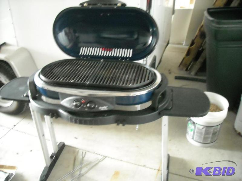 lot 363 image: Roadtrip Coleman colapsable grillgriddle, propane, case on wheels, great for tailgating