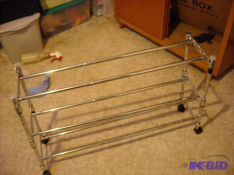 lot 73 image: metal shoe rack 34 wide...