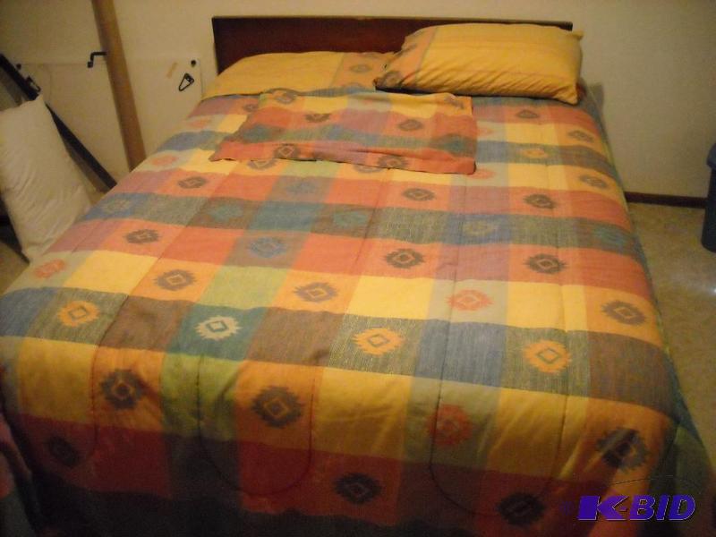 lot 83 image: full size bed with comforter with flat sheet,...