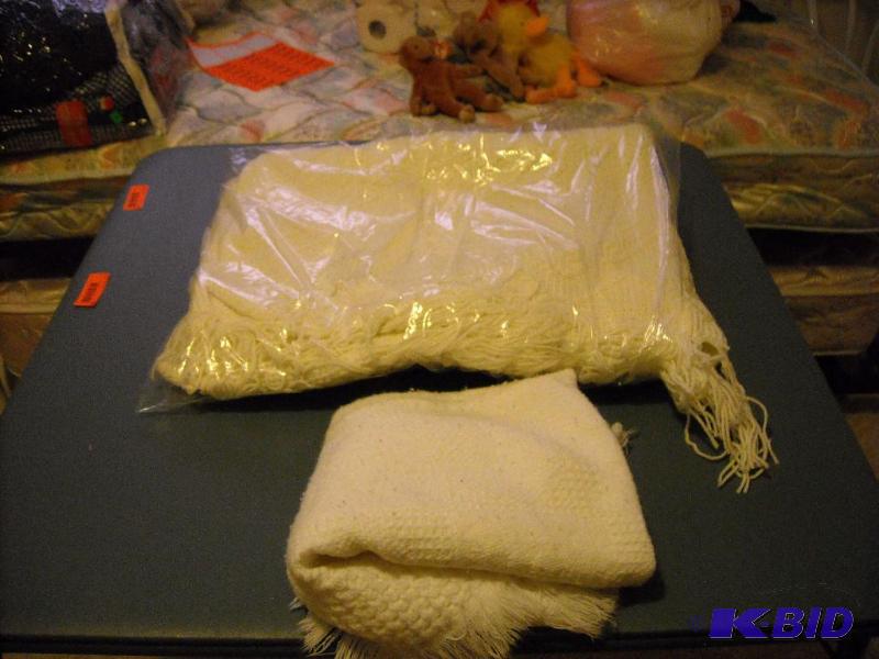 lot 99 image: white crochet blanket and baby blanket