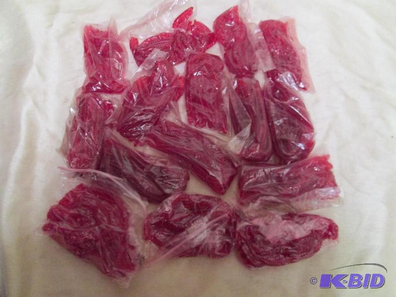 lot 110 image: Lot of 15 bags of 6 jig worms. Red in color. ...