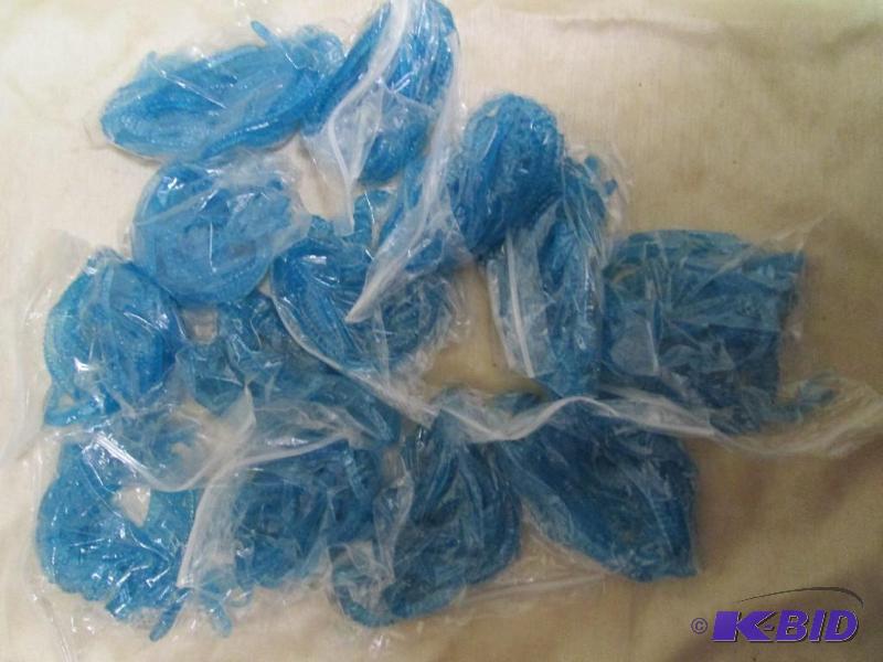 lot 124 image: Lot of 12 bags of 6 jig worms. Blue raspberry...