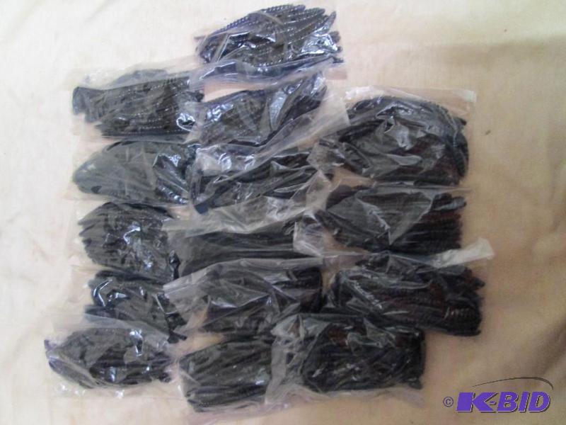lot 135 image: Lot of 15 bags of 4 jig worms. Dark blue in c...