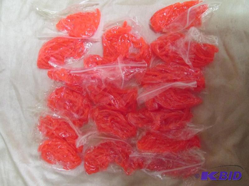 lot 137 image: Lot of 15 bags of 4 jig worms. Orange in colo...