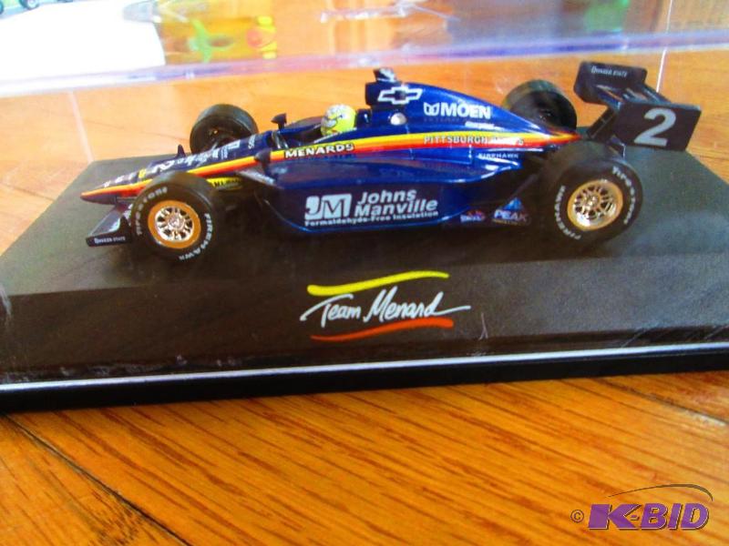 lot 14 image: Team Menard race car in hard plastic display...