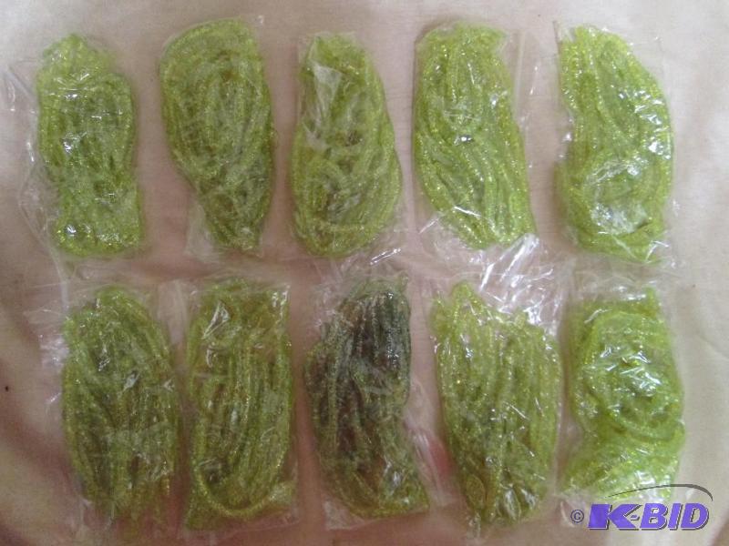 lot 148 image: Lot of 10 bags of 4 jig worms. Chartruse in c...
