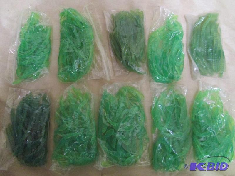 lot 167 image: Lot of 10 bags of 4 jig worms. Green in color...