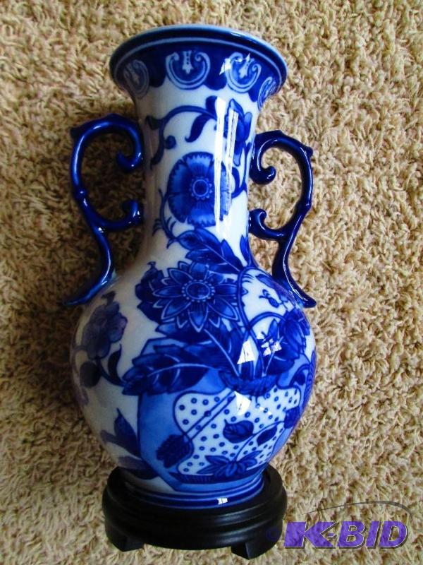 lot 23 image: Blue floral printed ceramic vase with stabili...