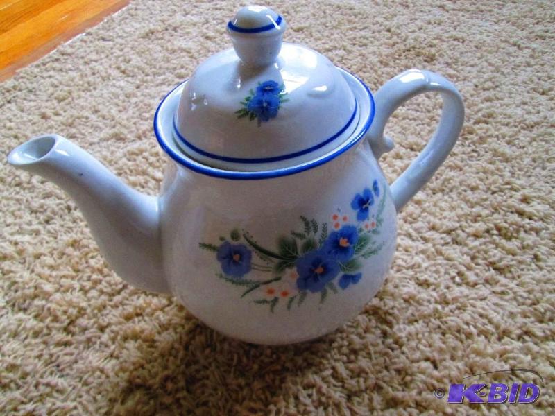 lot 24 image: Nice teapot with floral dcor...