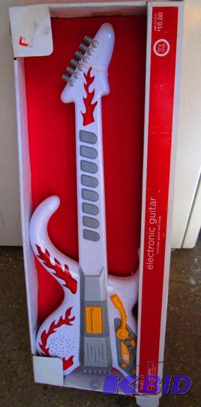 lot 32 image: New electronic guitar toy...