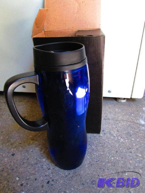 lot 39 image: New In box Leeds insulated coffee mug with ru...
