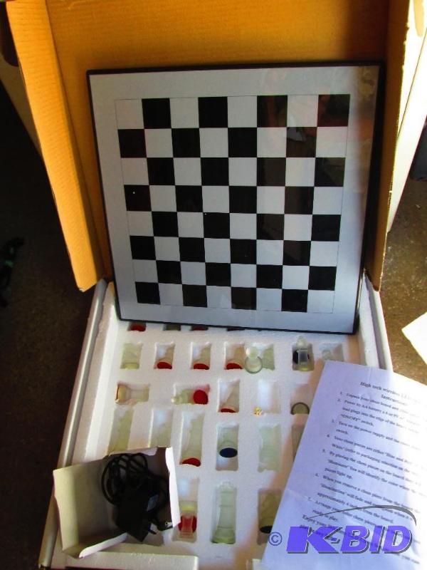 lot 41 image: LED Chess set with frosted glass pieces...