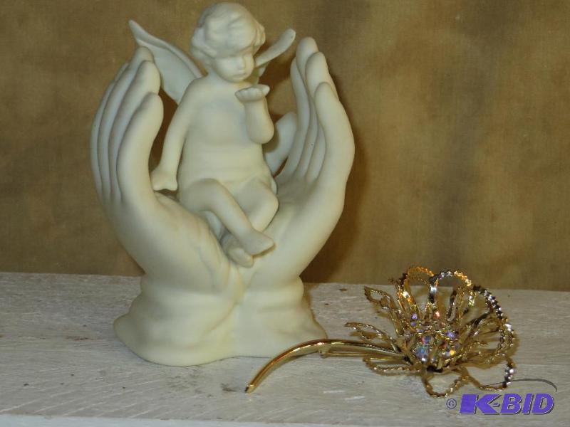 lot 103 image: Beautiful Gold Colored Pin with Sworovski Crystal and Angel in Hands Statue