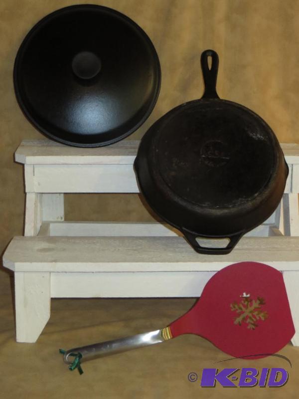 lot 116 image: Covered Lodge Cast Iron Pan and a Crate and Barrel Pancake Turner