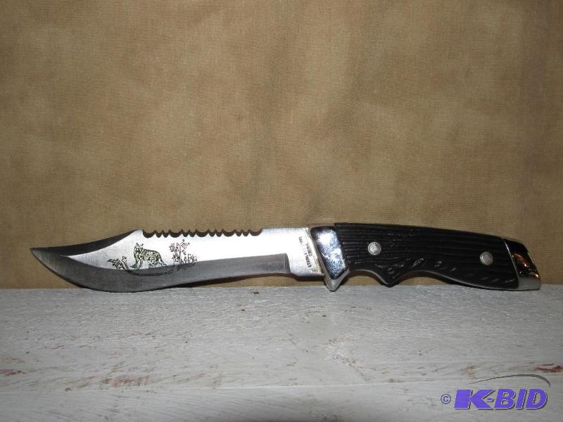 lot 130 image: Hunting Knife with Leapard etching on blade