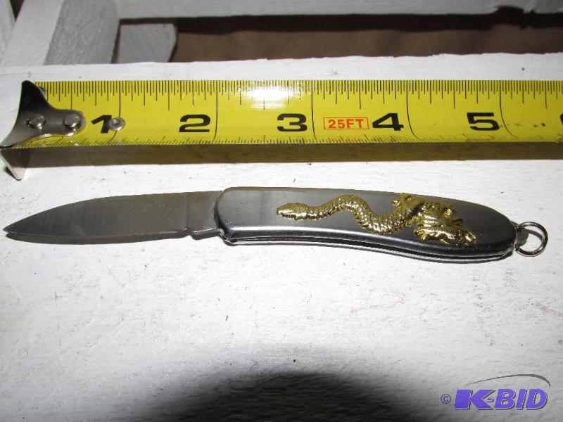 lot 155 image: Single Blade Pocket Knife with a Dragon