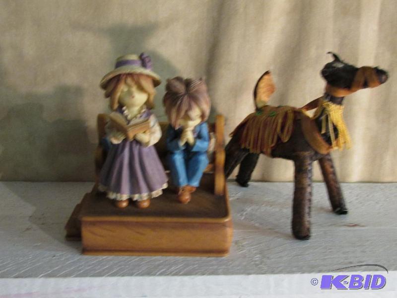 lot 162 image: Small Statue of Girl and Boy Praying and a Strange Looking Dog with a Saddle.