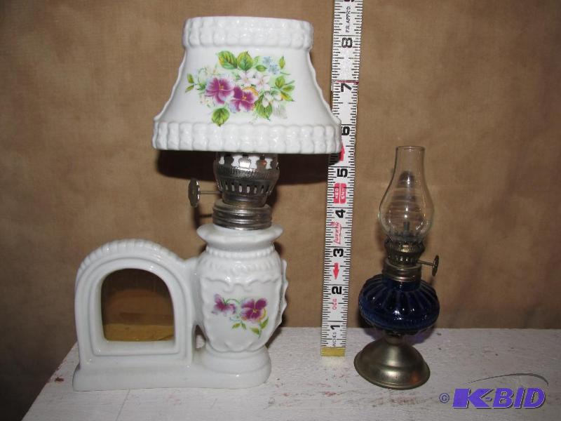lot 194 image: Vintage Porcelain Oil Lamp w Picture Frame and Small Vintage Oil Lamp with Cobalt Blue Oil Holder