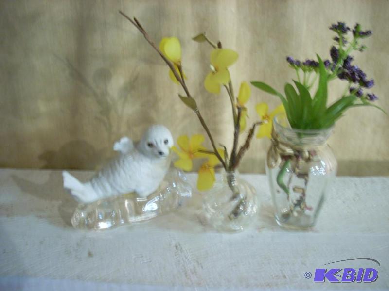lot 283 image: White Baby Seal, and Two Small Artificial Flower Arrangements
