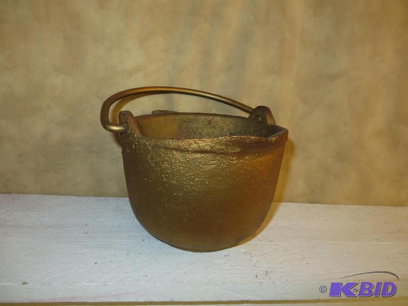 lot 42 image: Cast Iron Smelting Pot from Cedar Rapids, IA