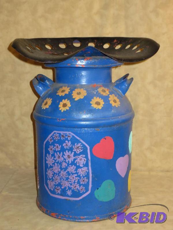 lot 53 image: Milk Can with Tractor Seat Stool.