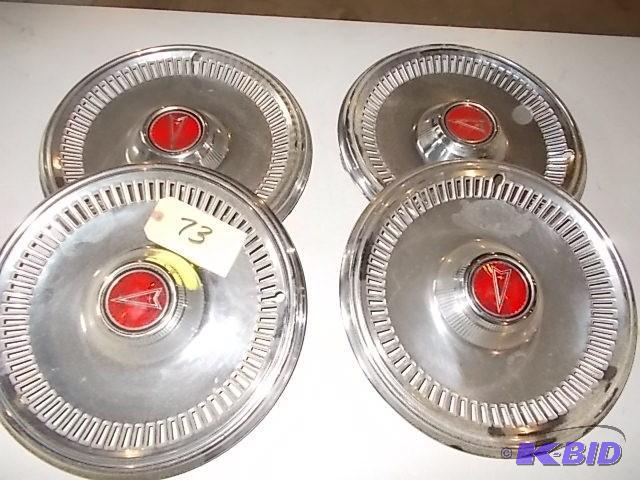 lot 73 image: Pontiac Hub Caps, From 1958-1966...