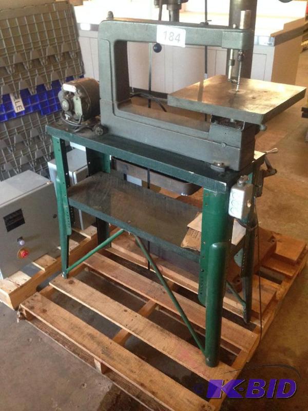 lot 184 image: Jigsaw on frame with motor....