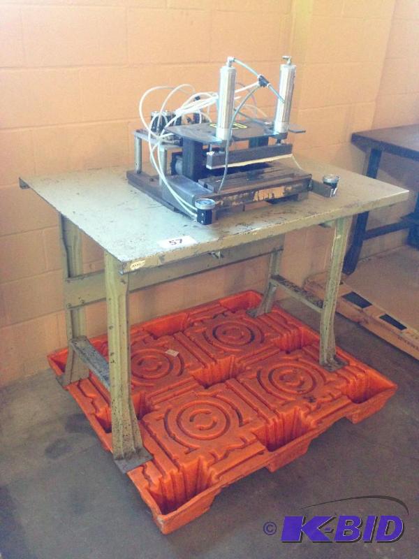 lot 57 image: Heavy duty metal work table with press mounte...