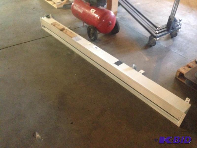 lot 94 image: Large recessed (in-ceiling) projector screen....