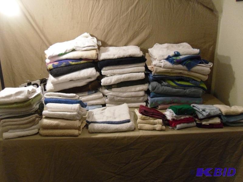 lot 105 image: Lot of 50 Bath, Hand, and Washcloth Towels. ...