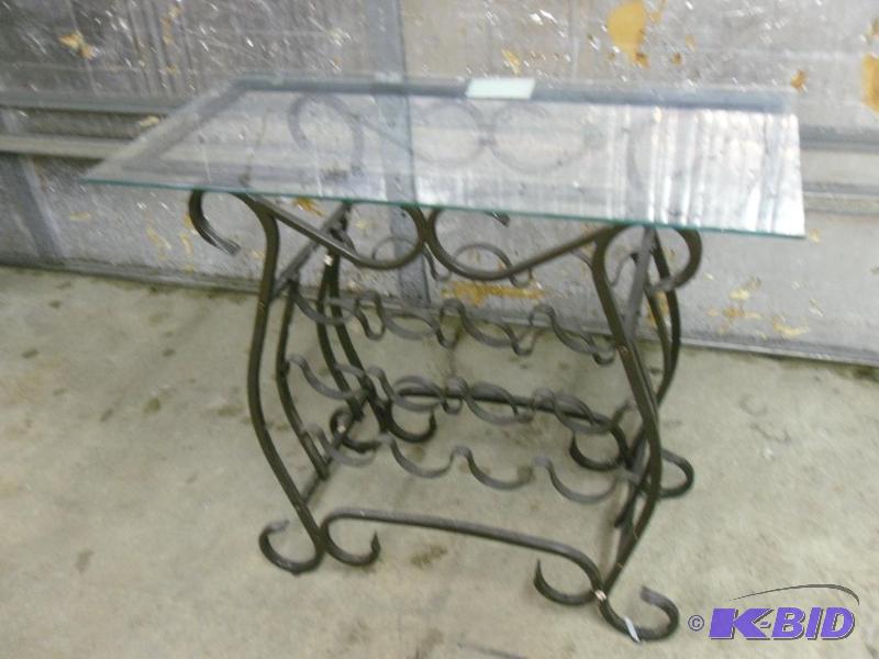 lot 106 image: Glass top wine rack  table. Steel frame, hol...