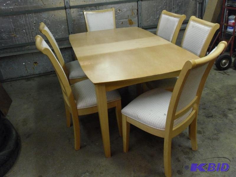 lot 13 image: Dining room table with 6 chairs. Has removabl...