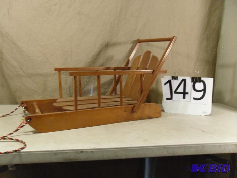 lot 149 image: Wood Sleigh. Measures 26" x 16" x 1...
