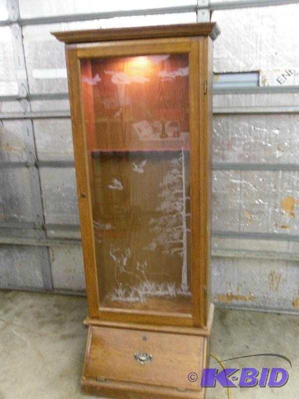 lot 15 image: 8 Gun and Bottom Storage Lighted Wood Gun Cab...