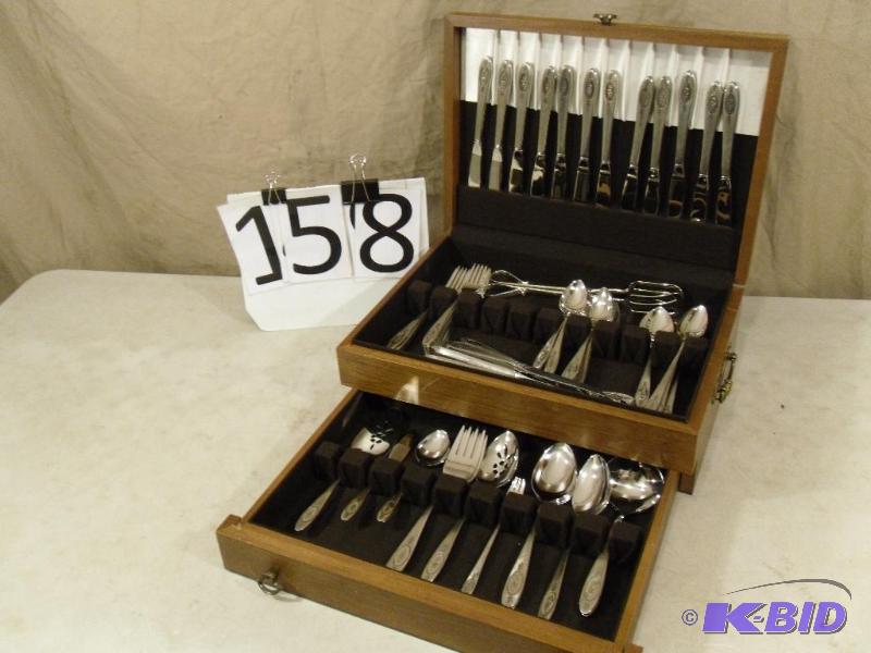 lot 158 image: Oneida Silverware Set in Wood Case. Marked On...
