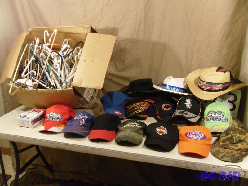 lot 173 image: Box of Plastic Hangers and Assorted Hats. Som...