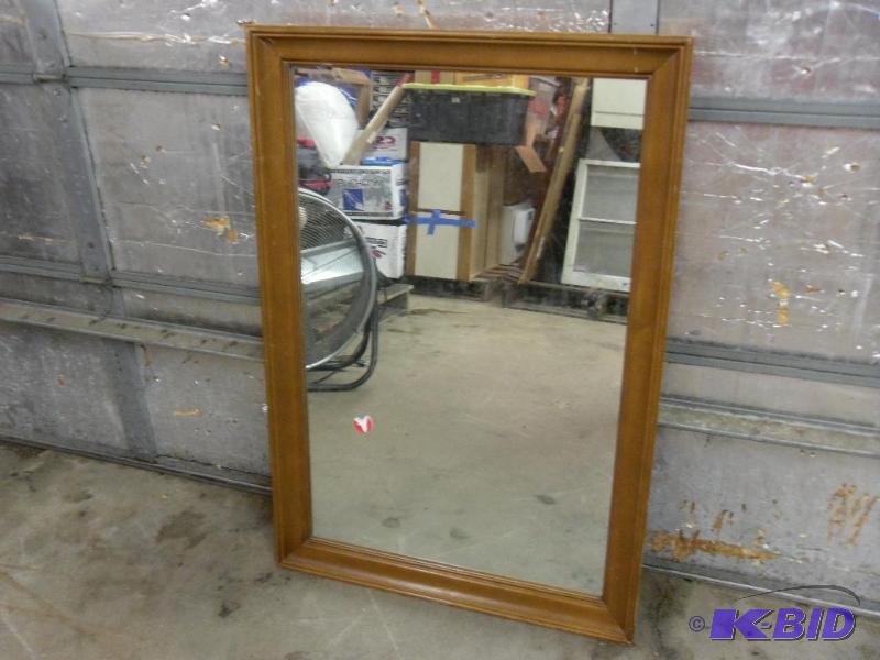 lot 18 image: Large Wood Framed Mirror. Measures 44.75"...