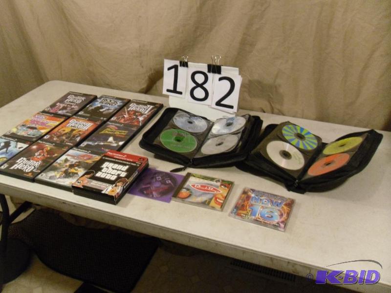 lot 182 image: Playstation 2 Games, CDs, and More. Some may...