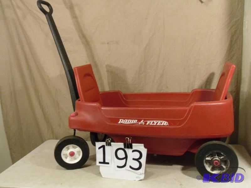 lot 193 image: Plastic Radio Flyer Wagon with Fold Down Seat...