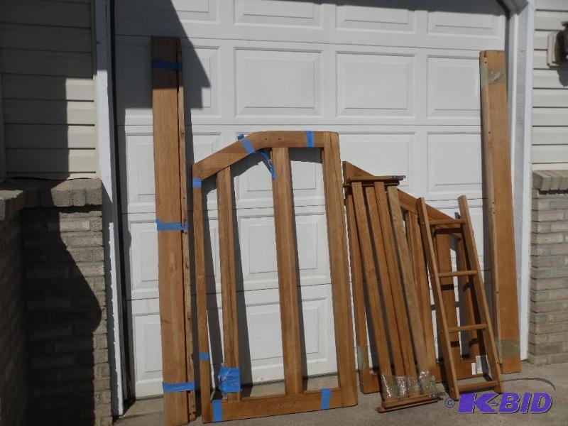 lot 21 image: Wood Bunkbeds. Comes with hardware and ladder...