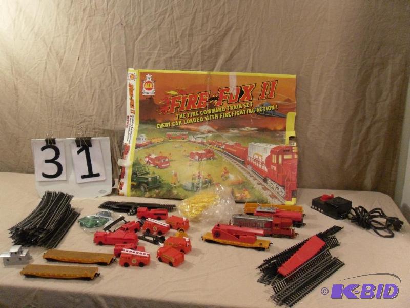 lot 31 image: AHM Fire Fox II The Fire Command Train Set. C...