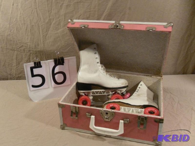 lot 56 image: Pink Case with Old Sunlite&nbspII Roller Ska...