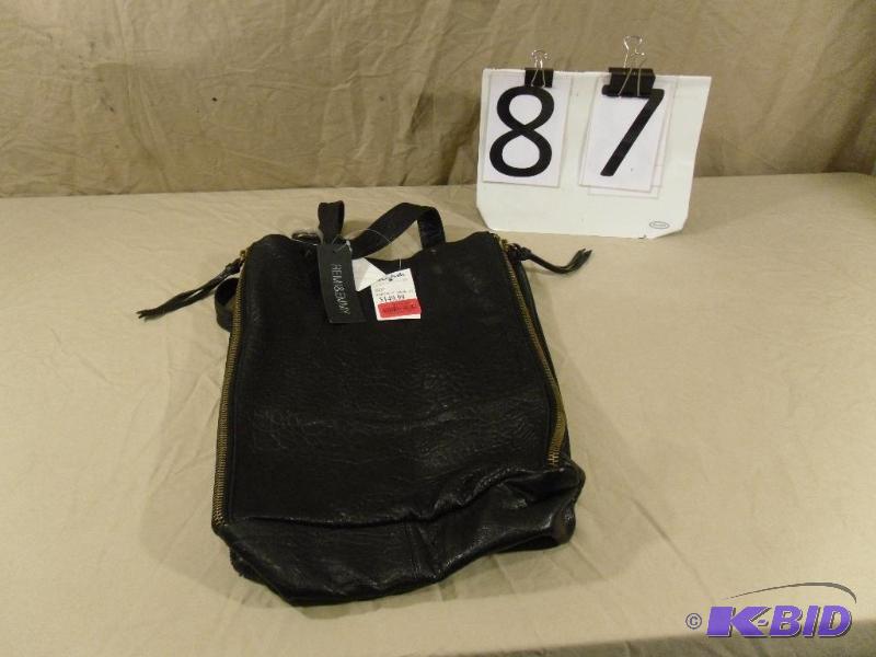 lot 87 image: New Black Remi and Emmy Purse. Retails for $1...