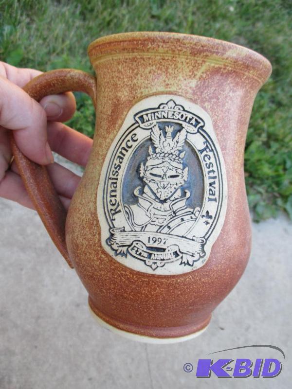 lot 119 image: medium brown coffee mug...