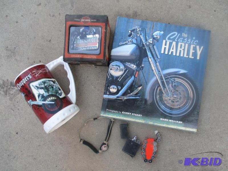 lot 163 image: book,born2 ride ornament, lighters, and orang...